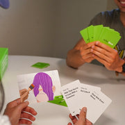 Two people playing wikiHow to Meme game. In the woman's left hand is a card depicting person being painted in purple paint, in her right hand are three cards that read "How to Hide That You're In Love with a Coworker," "How to Act Like Royalty," and "How to Deal with Exam Stress". Man is holding seven wikiHow Meme How-to title cards.